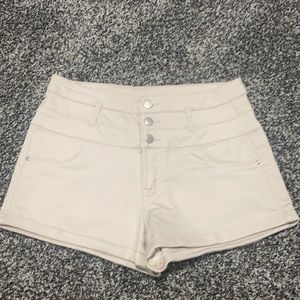High-waisted light cream colored shorts